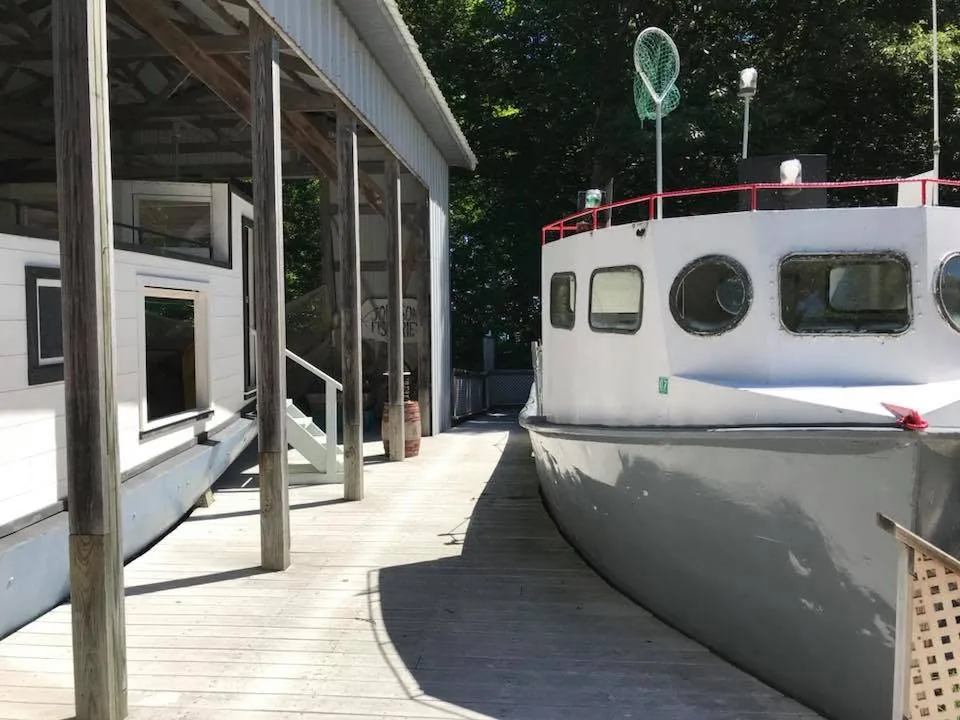 Kate A and Mary Kay in the boat shed