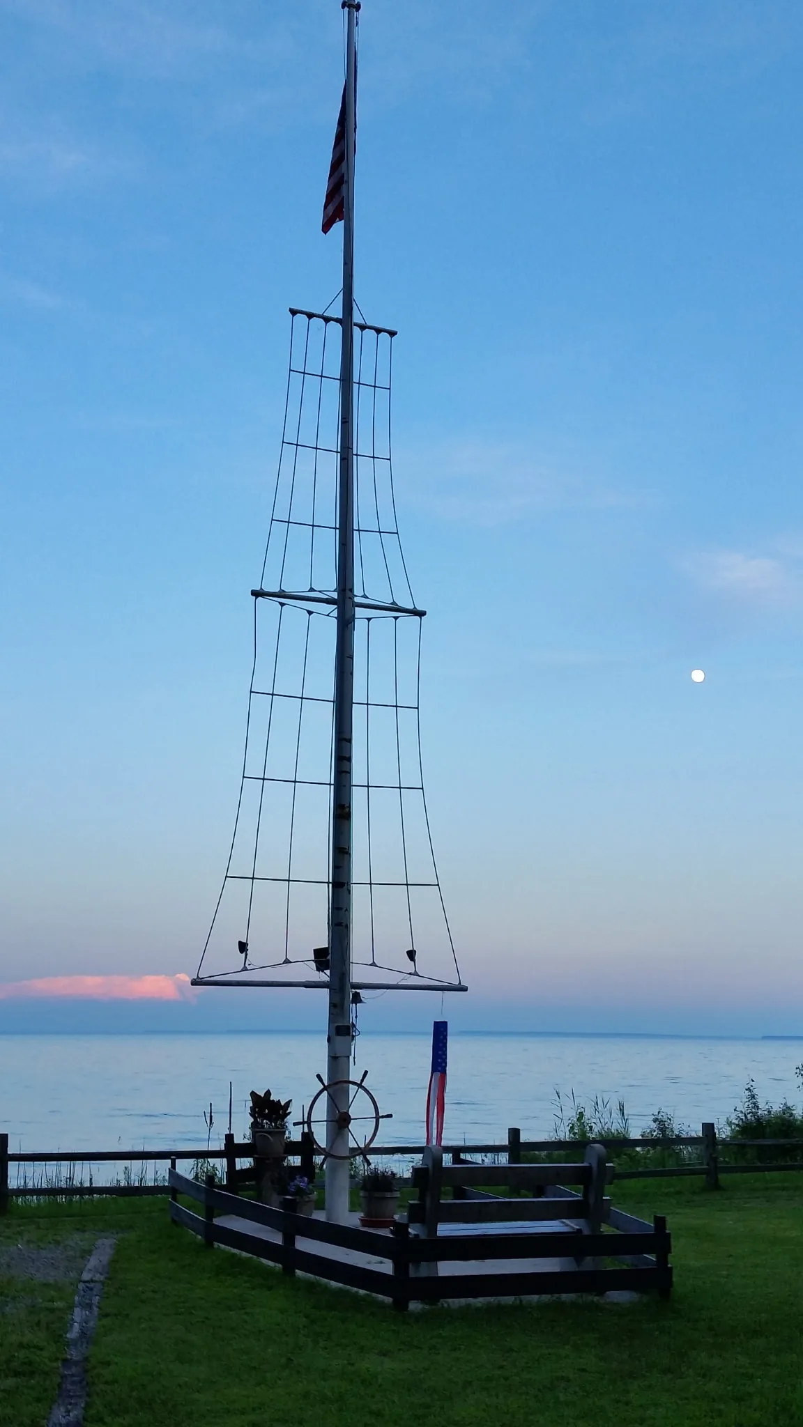 The fishing mast at dusk beside Green Bay